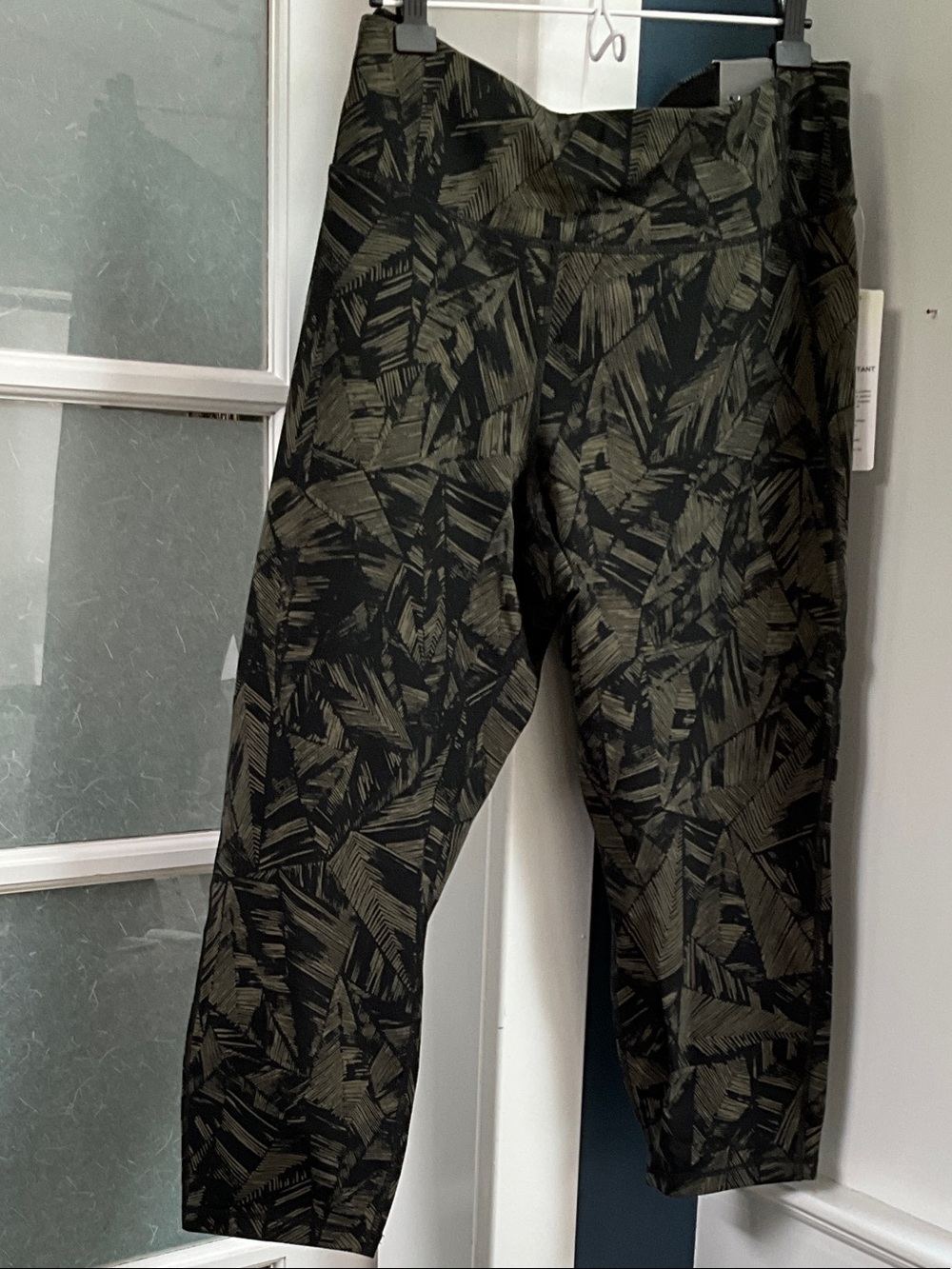Reitmans Olive Green and Black Patterned Leggings. Hyba